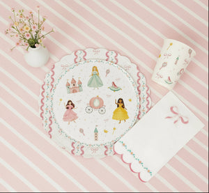 Close-up of fairy tale plates with crowns, slippers, and bows