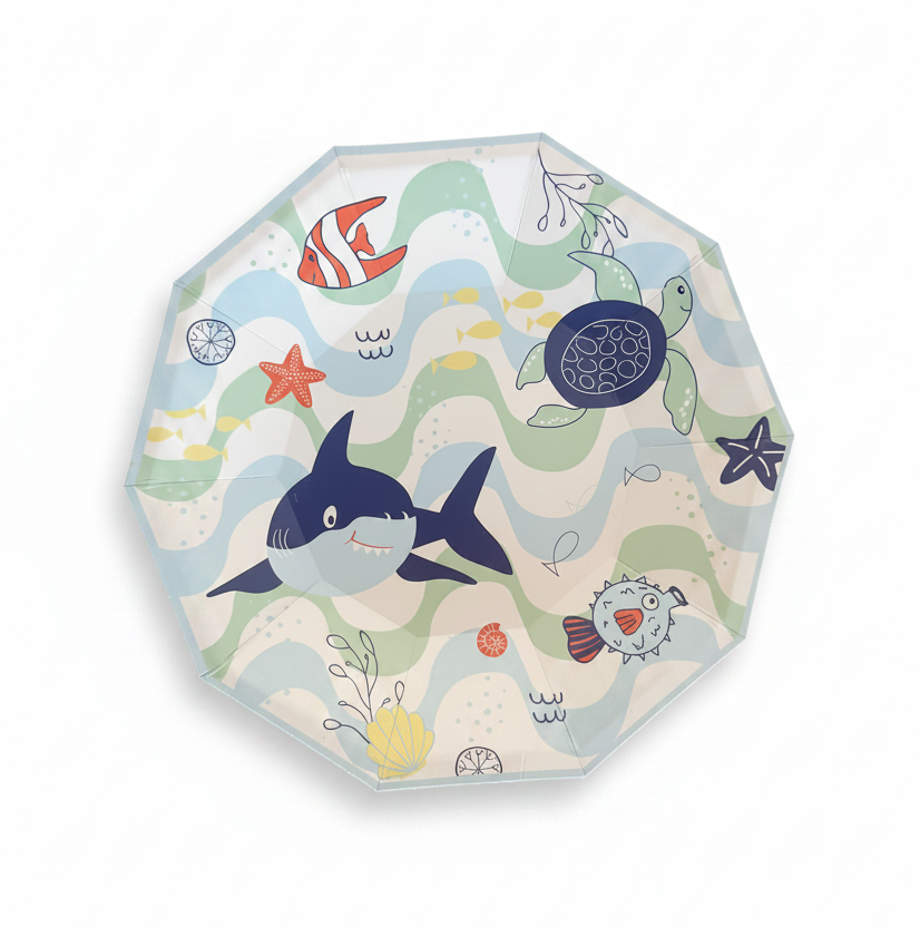 A round folding umbrella with a colorful underwater theme, featuring illustrations of a shark, turtle, fish, and starfish over wavy sea patterns on a white background.