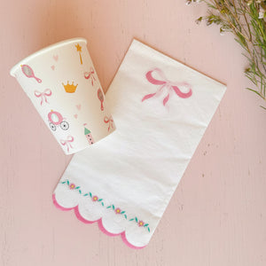 Coquette pink napkins with scalloped edges and floral details