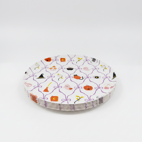 Decorative plate with Halloween-themed illustrations on a white background